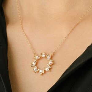 Gold Wreath Necklace with Swarovski Crystals on Holiday Card